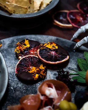 Creepy Blood Orange Crisps Cloaked in Dark Chocolate