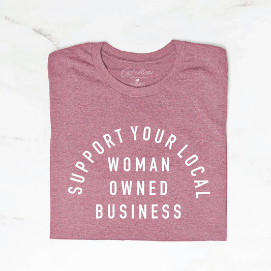 Mauve t-shirt with 'Support Your Local Woman Owned Business' text on a white background