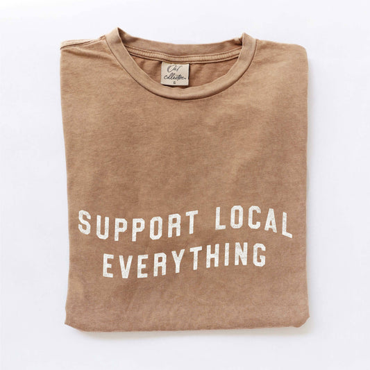Brown t-shirt with 'Support Local Everything' text on a white background